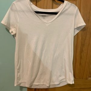 Cute plain white t shirt! Can dress it up!